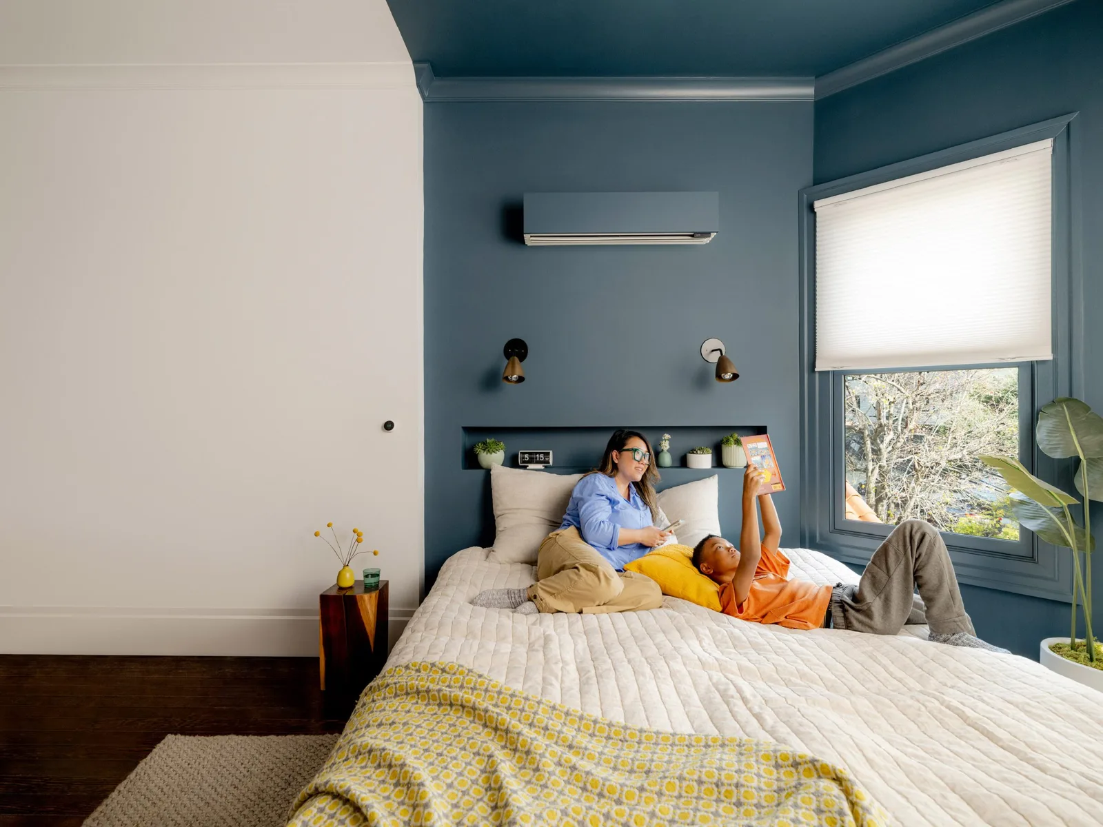 Quilt indoor unit mounted on a living room wall